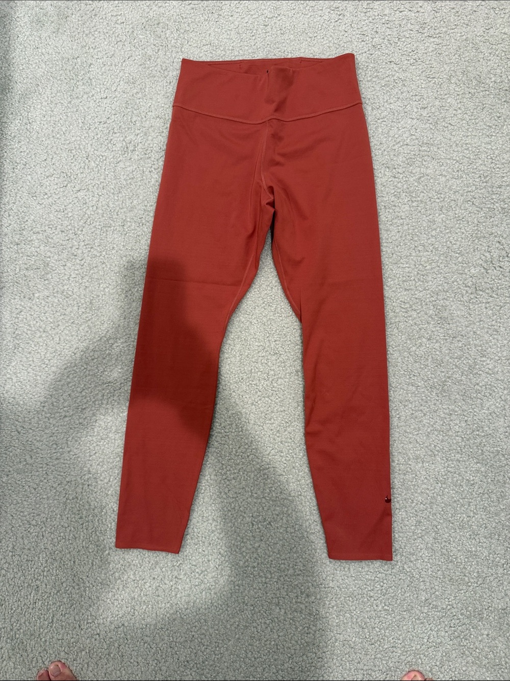 Nike Women’s High-Rise Brick Red Leggings medium
